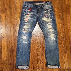 Cult of Individuality Distressed Blue Jeans with Red Details
